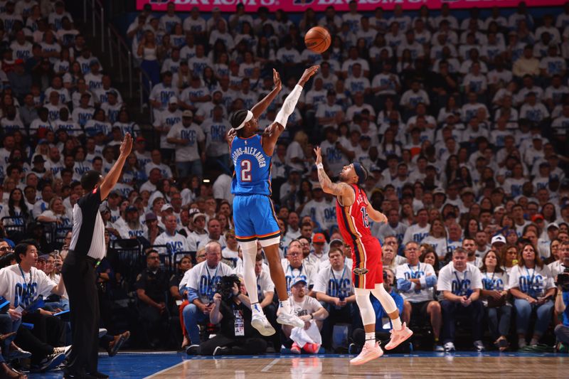 OKLAHOMA CITY, OK - APRIL 24: Shai Gilgeous-Alexander #2 of the Oklahoma City Thunder shoots the ball during the game against the New Orleans Pelicans during Round 1 Game 2 of the 2024 NBA Playoffs on April 24, 2024 at Paycom Arena in Oklahoma City, Oklahoma. NOTE TO USER: User expressly acknowledges and agrees that, by downloading and or using this photograph, User is consenting to the terms and conditions of the Getty Images License Agreement. Mandatory Copyright Notice: Copyright 2024 NBAE (Photo by Zach Beeker/NBAE via Getty Images)