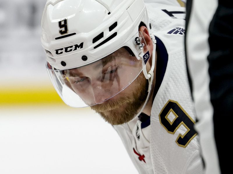 Mar 2, 2024; Detroit, Michigan, USA; Florida Panthers center Sam Bennett (9) gets set to face off in the first period against the Detroit Red Wings at Little Caesars Arena. Mandatory Credit: Rick Osentoski-USA TODAY Sports