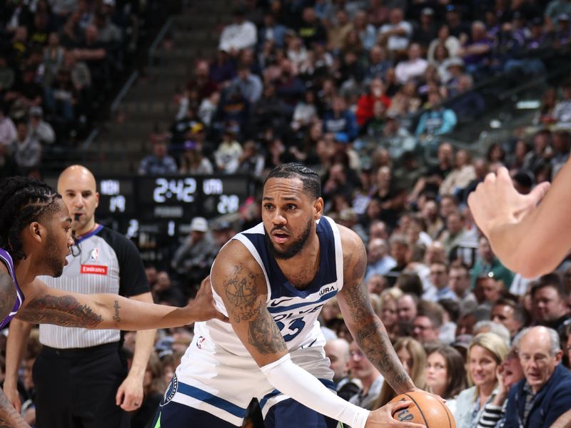 SALT LAKE CITY, UT - MARCH 18: Monte Morris #23 of the Minnesota Timberwolves handles the ball during the game against the Utah Jazz on March 18, 2024 at Delta Center in Salt Lake City, Utah. NOTE TO USER: User expressly acknowledges and agrees that, by downloading and or using this Photograph, User is consenting to the terms and conditions of the Getty Images License Agreement. Mandatory Copyright Notice: Copyright 2024 NBAE (Photo by Melissa Majchrzak/NBAE via Getty Images)