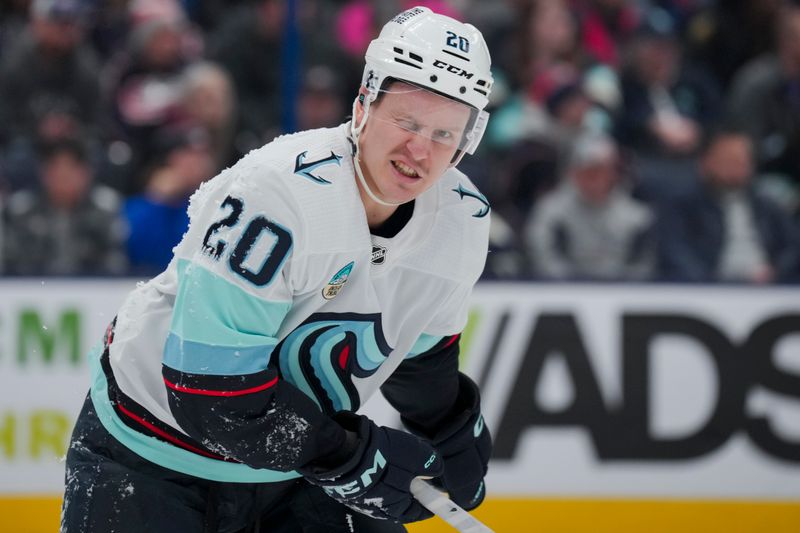 cJan 13, 2024; Columbus, Ohio, USA;  Seattle Kraken right wing Eeli Tolvanen (20) reacts to an official as he skates to the bench in the game against the Columbus Blue Jackets in the second period at Nationwide Arena. Mandatory Credit: Aaron Doster-USA TODAY Sports