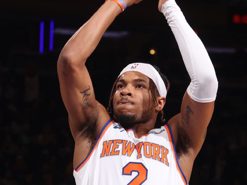 NEW YORK, NY - DECEMBER 5: Miles McBride #2 of the New York Knicks shoots a free throw during the game against the Charlotte Hornets  on December 5, 2024 at Madison Square Garden in New York City, New York.  NOTE TO USER: User expressly acknowledges and agrees that, by downloading and or using this photograph, User is consenting to the terms and conditions of the Getty Images License Agreement. Mandatory Copyright Notice: Copyright 2024 NBAE  (Photo by Nathaniel S. Butler/NBAE via Getty Images)