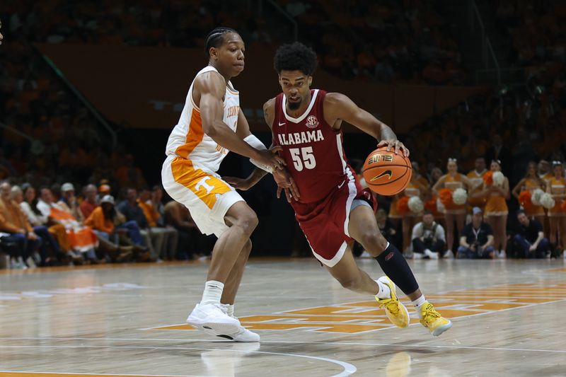 Jan 20, 2024; Knoxville, Tennessee, USA; Alabama Crimson Tide guard Aaron Estrada (55) moves the ball against Tennessee Volunteers guard Jordan Gainey (2) during the second half at Thompson-Boling Arena at Food City Center. Mandatory Credit: Randy Sartin-USA TODAY Sports