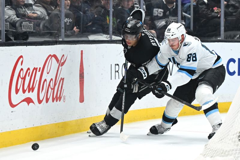 Mar 28, 2026; Los Angeles, California, USA; Los Angeles Kings right wing Quinton Byfield (55) and Utah Mammoth defenseman Nate Schmidt (88) battle for the puck during the second period at Crypto.com Arena. Mandatory Credit: Griffin Hooper-Imagn Images
Mar 28, 2026; Los Angeles, California, USA; Los Angeles Kings right wing Quinton Byfield (55) and Utah Mammoth defenseman Nate Schmidt (88) battle for the puck during the second period at Crypto.com Arena. Mandatory Credit: Griffin Hooper-Imagn Images