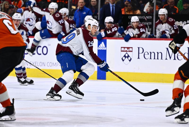 Jan 20, 2024; Philadelphia, Pennsylvania, USA; Colorado Avalanche center Nathan MacKinnon (29) controls the puck against the Philadelphia Flyers in the first period at Wells Fargo Center. Mandatory Credit: Kyle Ross-USA TODAY Sports