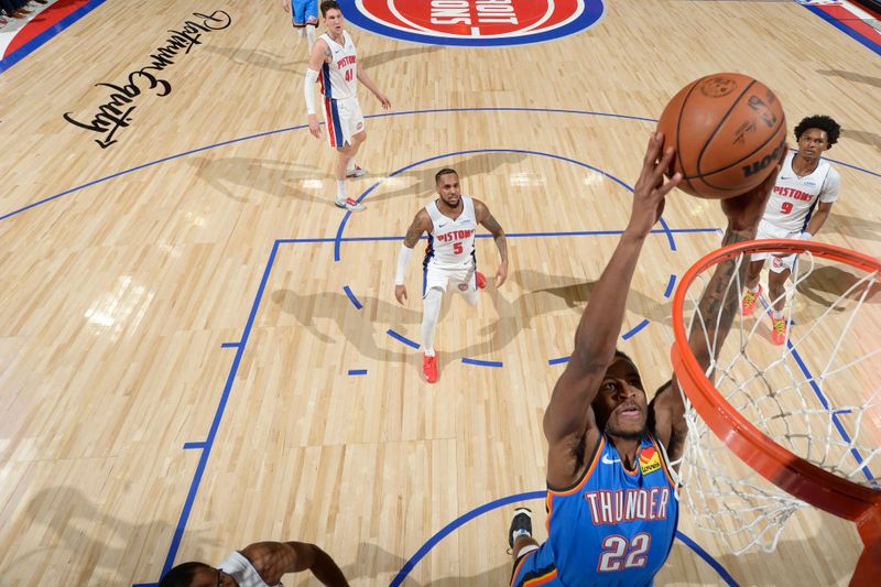 DETROIT, MI - JANUARY 28: Cason Wallace #22 of the Oklahoma City Thunder dunks the ball during the game against the Detroit Pistons on January 28, 2024 at Little Caesars Arena in Detroit, Michigan. NOTE TO USER: User expressly acknowledges and agrees that, by downloading and/or using this photograph, User is consenting to the terms and conditions of the Getty Images License Agreement. Mandatory Copyright Notice: Copyright 2024 NBAE (Photo by Chris Schwegler/NBAE via Getty Images)