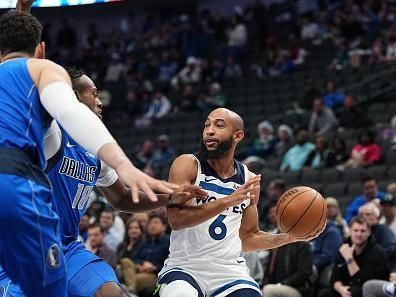 DALLAS, TX - DECEMBER 14: Jordan McLaughlin #6 of the Minnesota Timberwolves handles the ball during the game against the Dallas Mavericks  on December 14, 2023 at the American Airlines Center in Dallas, Texas. NOTE TO USER: User expressly acknowledges and agrees that, by downloading and or using this photograph, User is consenting to the terms and conditions of the Getty Images License Agreement. Mandatory Copyright Notice: Copyright 2023 NBAE (Photo by Glenn James/NBAE via Getty Images)