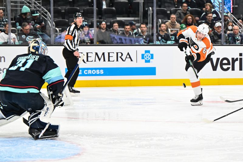 Feb 16, 2023; Seattle, Washington, USA; Philadelphia Flyers defenseman Travis Sanheim (6) shoots the puck against the Seattle Kraken during the second period at Climate Pledge Arena. Mandatory Credit: Steven Bisig-USA TODAY Sports