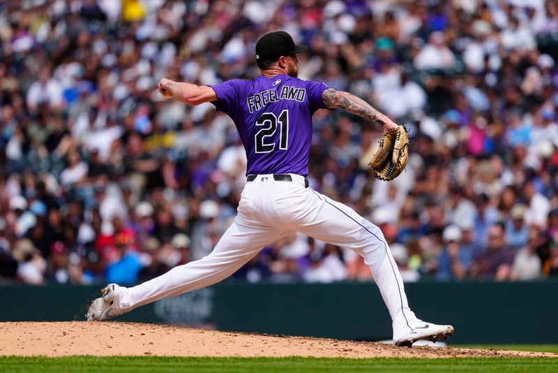 May 24, 2025; Denver, Colorado, USA; Colorado Rockies starting pitcher Kyle Freeland (21) delivers a pitch in the fourth inning against the Colorado Rockies at Coors Field. Mandatory Credit: Ron Chenoy-Imagn Images