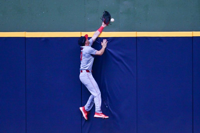 Jul 14, 2024; Milwaukee, Wisconsin, USA; Washington Nationals center fielder Jacob Young (30) cannot catch a ball hit by Milwaukee Brewers catcher William Contreras (not pictured) for a home run in the third inning at American Family Field. Mandatory Credit: Benny Sieu-USA TODAY Sports