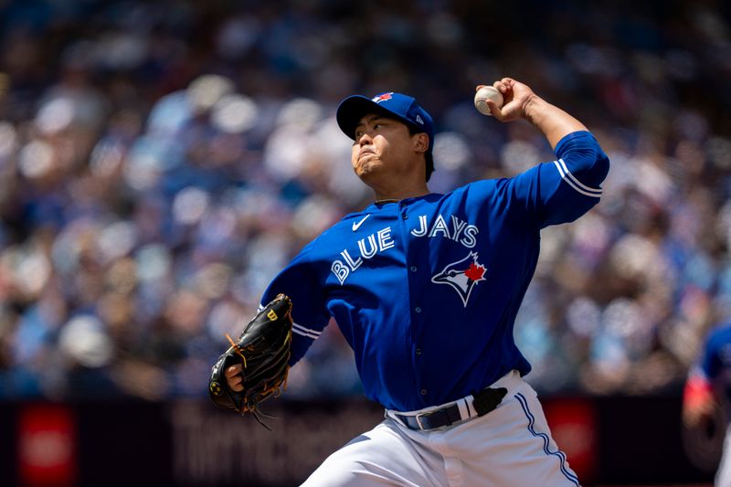 Aug 13, 2023; Toronto, Ontario, CAN; Toronto Blue Jays starting pitcher Hyun Jin Ryu (99) pitches to the Chicago Cubs during the second inning at Rogers Centre. Mandatory Credit: Kevin Sousa-USA TODAY Sports