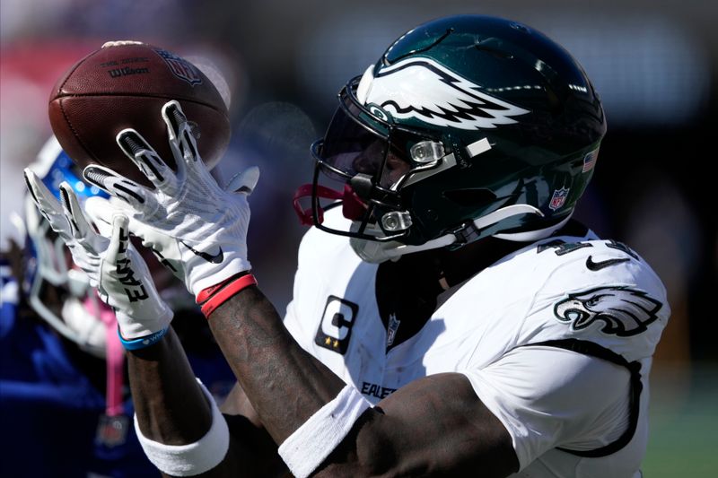 Philadelphia Eagles wide receiver A.J. Brown (11) makes a touchdown catch against the New York Giants during the second quarter of an NFL football game, Sunday, Oct. 20, 2024, in East Rutherford, N.J. (AP Photo/Frank Franklin II)