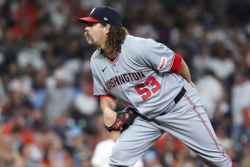 Jul 29, 2025; Houston, Texas, USA; Washington Nationals relief pitcher Andrew Chafin (53) looks in before a pitch during the fifth inning against the Houston Astros at Daikin Park. Mandatory Credit: Troy Taormina-Imagn Images
