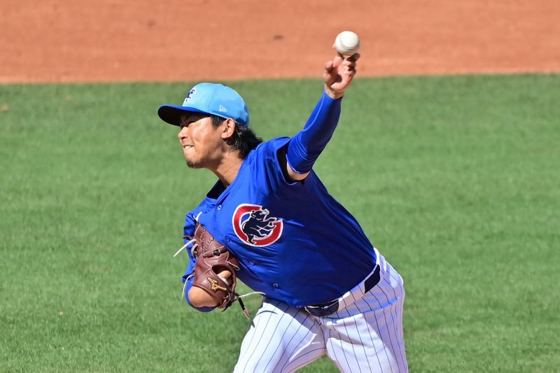 Mar 8, 2024; Mesa, Arizona, USA;  Chicago Cubs starting pitcher Shota Imanaga (18) throws in the third inning against the Seattle Mariners during a spring training game at Sloan Park. Mandatory Credit: Matt Kartozian-USA TODAY Sports