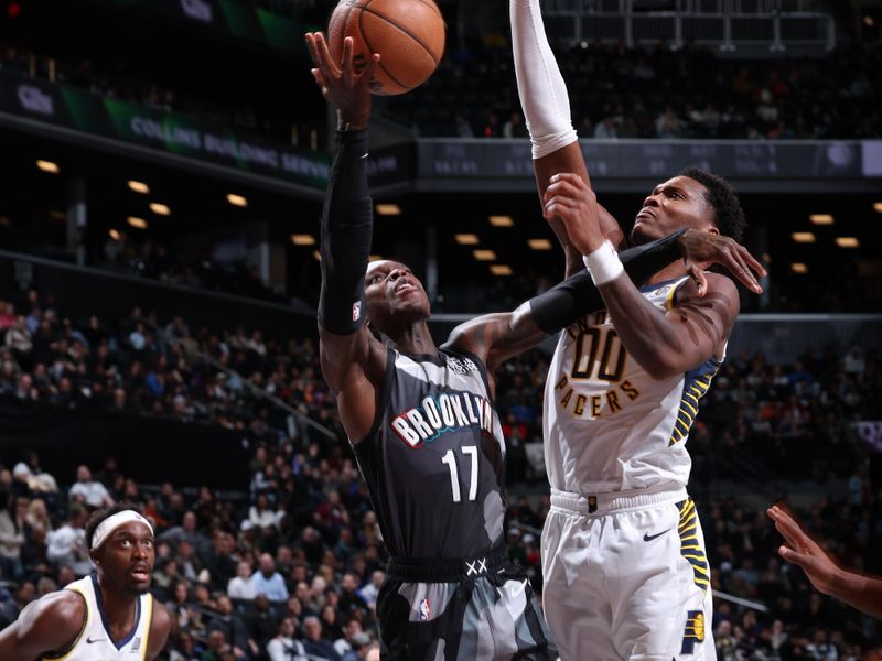 BROOKLYN, NY - DECEMBER 4: Dennis Schroder #17 of the Brooklyn Nets drives to the basket during the game against the Indiana Pacers on December 4, 2024 at Barclays Center in Brooklyn, New York. NOTE TO USER: User expressly acknowledges and agrees that, by downloading and or using this Photograph, user is consenting to the terms and conditions of the Getty Images License Agreement. Mandatory Copyright Notice: Copyright 2024 NBAE (Photo by Jeff Haynes/NBAE via Getty Images)