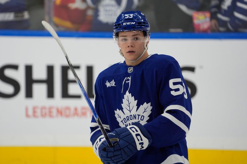 Oct 28, 2025; Toronto, Ontario, CAN; Toronto Maple Leafs forward Easton Cowan (53) skates during warm up before a game against the Calgary Flames at Scotiabank Arena. Mandatory Credit: John E. Sokolowski-Imagn Images