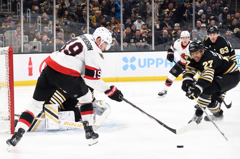 Mar 19, 2024; Boston, Massachusetts, USA;  Ottawa Senators right wing Drake Batherson (19) tries to gain control of the puck while Boston Bruins defenseman Hampus Lindholm (27) defends during the third period at TD Garden. Mandatory Credit: Bob DeChiara-USA TODAY Sports