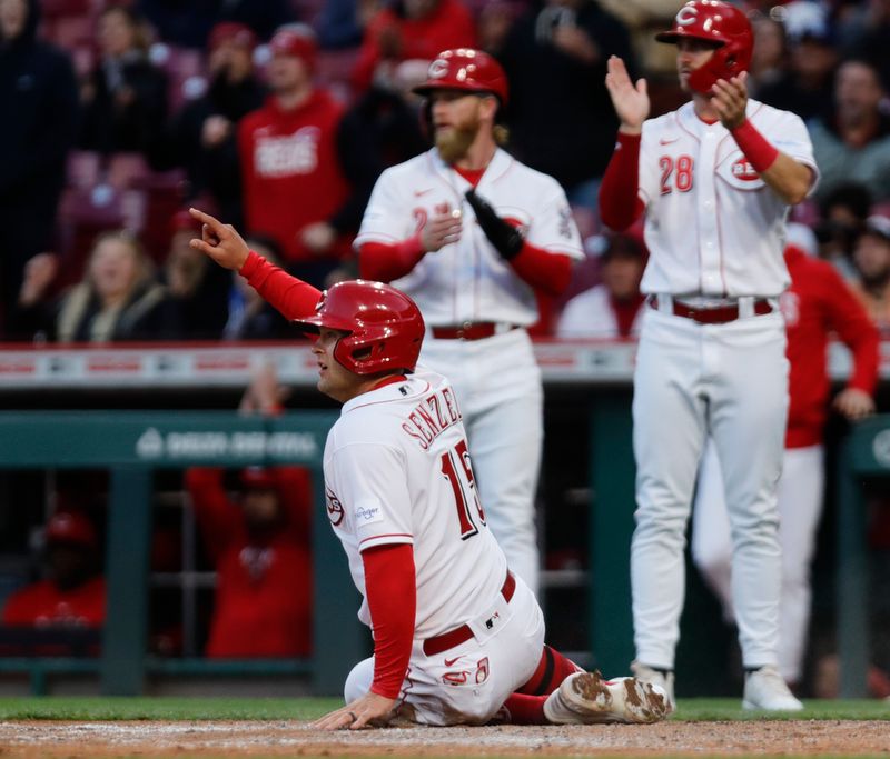 Apr 17, 2023; Cincinnati, Ohio, USA; Cincinnati Reds third baseman Nick Senzel (15) reacts after scoring against the Tampa Bay Rays during the fourth inning at Great American Ball Park. Mandatory Credit: David Kohl-USA TODAY Sports