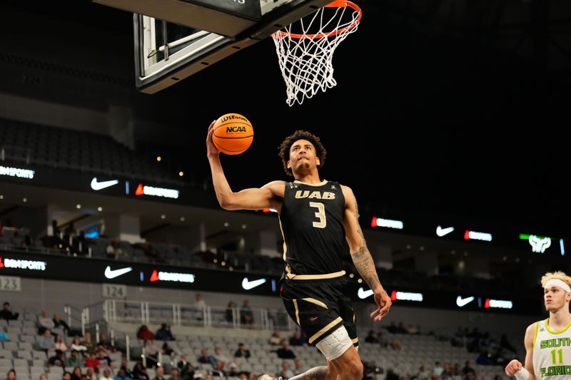 Mar 16, 2024; Fort Worth, TX, USA; UAB Blazers forward Yaxel Lendeborg (3) dunks the ball ahead of South Florida Bulls forward Kasean Pryor (11) during the second half at Dickies Arena. Mandatory Credit: Chris Jones-USA TODAY Sports