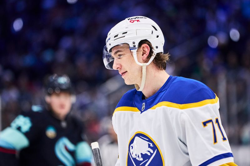 Dec 14, 2025; Seattle, Washington, USA; Buffalo Sabres center Ryan McLeod (71) looks on during the second period against the Seattle Kraken at Climate Pledge Arena. Mandatory Credit: Blake Dahlin-Imagn Images