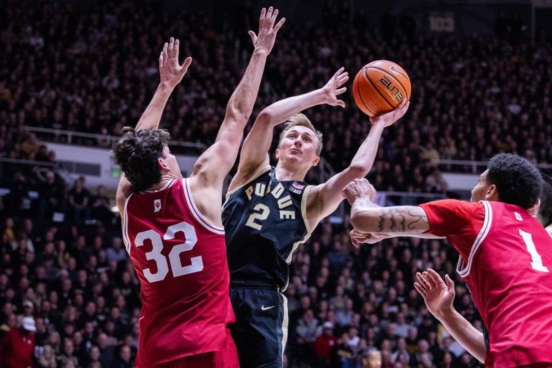 Feb 10, 2024; West Lafayette, Indiana, USA; Purdue Boilermakers guard Fletcher Loyer (2) shoots the ball while Indiana Hoosiers guard Trey Galloway (32) defends in the second half at Mackey Arena. Mandatory Credit: Trevor Ruszkowski-USA TODAY Sports