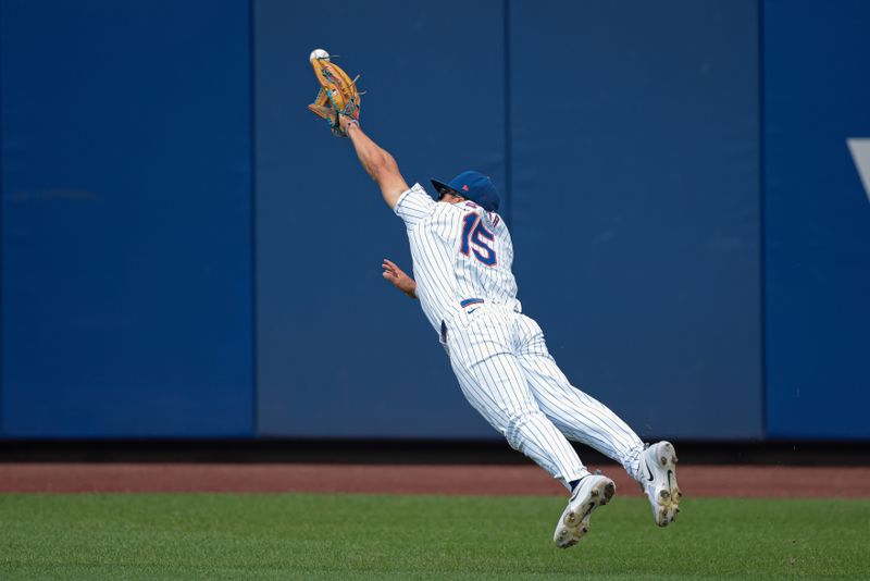 Aug 18, 2024; New York City, New York, USA; New York Mets right fielder Tyrone Taylor (15) dives for a ball hit by Miami Marlins second baseman Otto Lopez (61) for a triple during the third inning against the Miami Marlins at Citi Field. Mandatory Credit: Vincent Carchietta-USA TODAY Sports