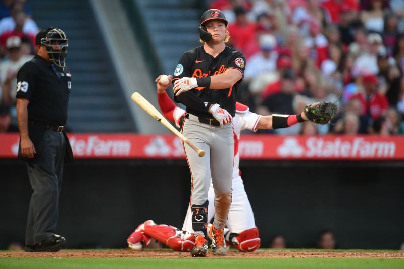 May 10, 2025; Anaheim, California, USA; Baltimore Orioles second baseman Jackson Holliday (7) draws a walk against the Los Angeles Angels during the third inning at Angel Stadium. Mandatory Credit: Gary A. Vasquez-Imagn Images