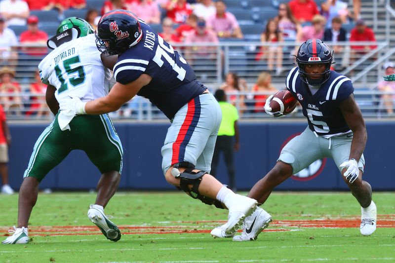 Sep 20, 2025; Oxford, Mississippi, USA; Mississippi Rebels running back Kewan Lacy (5) runs the ball as offensive lineman Patrick Kutas (75) blocks Tulane Green Wave linebacker Sam Howard (15) during the second quarter at Vaught-Hemingway Stadium. Mandatory Credit: Petre Thomas-Imagn Images