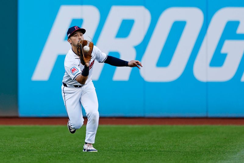 Oct 7, 2024; Cleveland, Ohio, USA; Cleveland Guardians outfielder Steven Kwan (38) catches a fly during the second inning against the Detroit Tigers during game two of the ALDS for the 2024 MLB Playoffs at Progressive Field. Mandatory Credit: Scott Glavin-Imagn Images