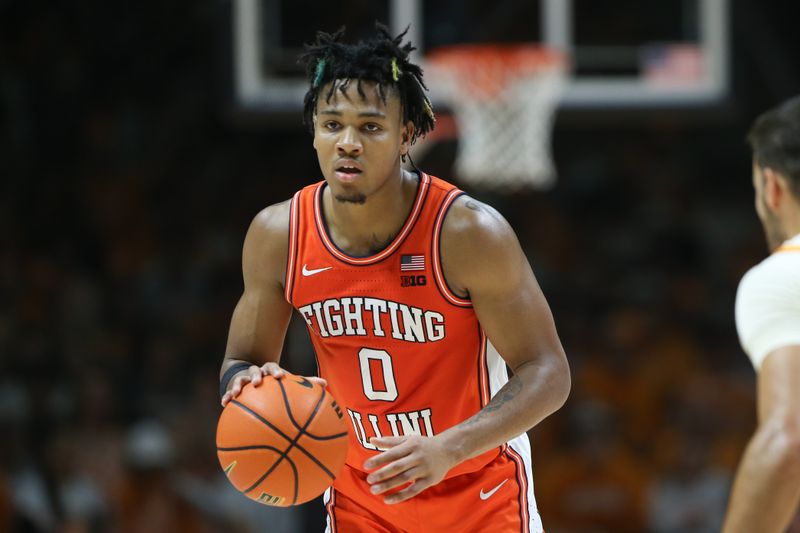 Dec 9, 2023; Knoxville, Tennessee, USA; Illinois Fighting Illini guard Terrence Shannon Jr. (0) brings the ball up court against the Tennessee Volunteers during the second half at Food City Center at Thompson Boling Arena. Mandatory Credit: Randy Sartin-USA TODAY Sports