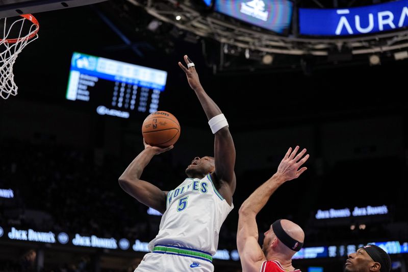 MINNEAPOLIS, MN -  MARCH 31: Anthony Edwards #5 of the Minnesota Timberwolves shoots the ball during the game against the Chicago Bulls on March 31, 2024 at Target Center in Minneapolis, Minnesota. NOTE TO USER: User expressly acknowledges and agrees that, by downloading and or using this Photograph, user is consenting to the terms and conditions of the Getty Images License Agreement. Mandatory Copyright Notice: Copyright 2024 NBAE (Photo by Jordan Johnson/NBAE via Getty Images)