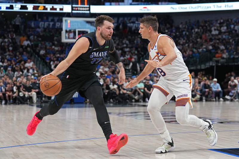 DALLAS, TX - FEBRUARY 22: Luka Doncic #77 of the Dallas Mavericks handles the ball during the game against the Phoenix Suns on February 22, 2024 at the American Airlines Center in Dallas, Texas. NOTE TO USER: User expressly acknowledges and agrees that, by downloading and or using this photograph, User is consenting to the terms and conditions of the Getty Images License Agreement. Mandatory Copyright Notice: Copyright 2024 NBAE (Photo by Glenn James/NBAE via Getty Images)