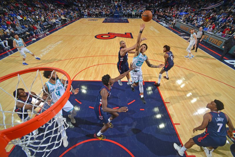 PHILADELPHIA, PA - MARCH 16: Tre Mann #23 of the Charlotte Hornets shoots the ball during the game against the Philadelphia 76ers on March 16, 2024 at the Wells Fargo Center in Philadelphia, Pennsylvania NOTE TO USER: User expressly acknowledges and agrees that, by downloading and/or using this Photograph, user is consenting to the terms and conditions of the Getty Images License Agreement. Mandatory Copyright Notice: Copyright 2024 NBAE (Photo by Jesse D. Garrabrant/NBAE via Getty Images)