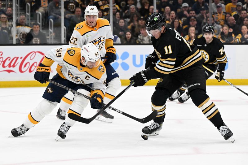 Oct 14, 2023; Boston, Massachusetts, USA; Boston Bruins center Trent Frederic (11) and Nashville Predators defenseman Roman Josi (59) battle for the puck during the second period at the TD Garden. Mandatory Credit: Brian Fluharty-USA TODAY Sports