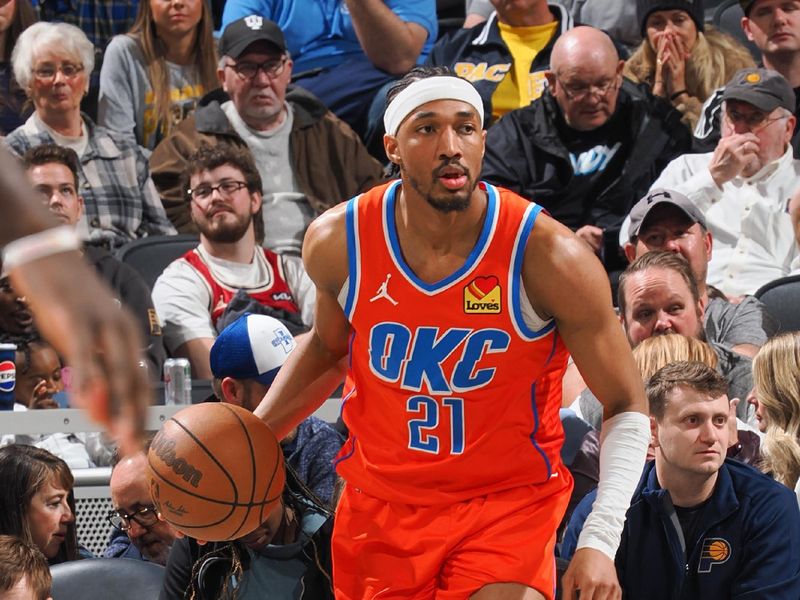 INDIANAPOLIS, IN - APRIL 5:  Aaron Wiggins #21 of the Oklahoma City Thunder handles the ball during the game on April 5, 2024 at Gainbridge Fieldhouse in Indianapolis, Indiana. NOTE TO USER: User expressly acknowledges and agrees that, by downloading and or using this Photograph, user is consenting to the terms and conditions of the Getty Images License Agreement. Mandatory Copyright Notice: Copyright 2024 NBAE (Photo by Ron Hoskins/NBAE via Getty Images)