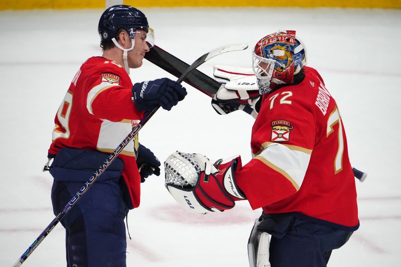Dec 29, 2023; Sunrise, Florida, USA; Florida Panthers left wing Matthew Tkachuk (19) celebrates with Florida Panthers goaltender Sergei Bobrovsky (72) after defeating the New York Rangers at Amerant Bank Arena. Mandatory Credit: Jasen Vinlove-USA TODAY Sports