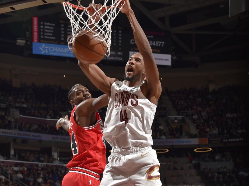 CLEVELAND, OH - FEBRUARY 11: Evan Mobley #4 of the Cleveland Cavaliers dunks the ball during the game against the Chicago Bulls on February 11, 2023 at Rocket Mortgage FieldHouse in Cleveland, Ohio. NOTE TO USER: User expressly acknowledges and agrees that, by downloading and/or using this Photograph, user is consenting to the terms and conditions of the Getty Images License Agreement. Mandatory Copyright Notice: Copyright 2023 NBAE (Photo by David Liam Kyle/NBAE via Getty Images)