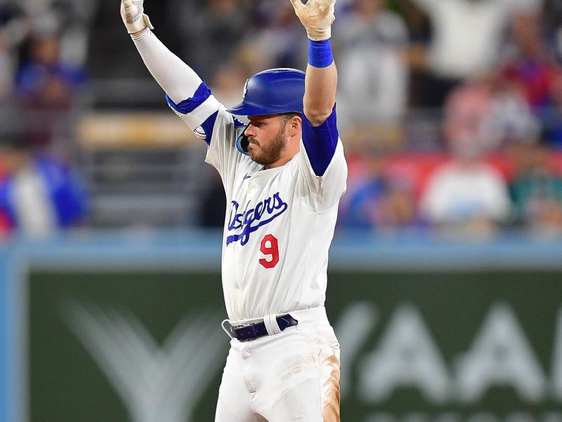 May 31, 2024; Los Angeles, California, USA; Los Angeles Dodgers second baseman Gavin Lux (9) reaches second on a double against the Colorado Rockies during the eighth inning at Dodger Stadium. Mandatory Credit: Gary A. Vasquez-USA TODAY Sports