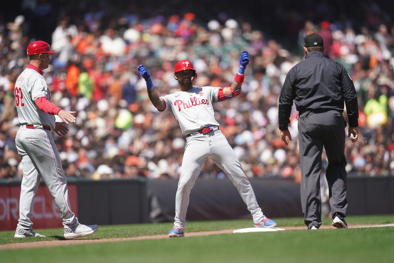 May 27, 2024; San Francisco, California, USA; Philadelphia Phillies shortstop Edmundo Sosa (33) reacts after hitting a triple against the San Francisco Giants in the fourth inning at Oracle Park. Mandatory Credit: Cary Edmondson-USA TODAY Sports