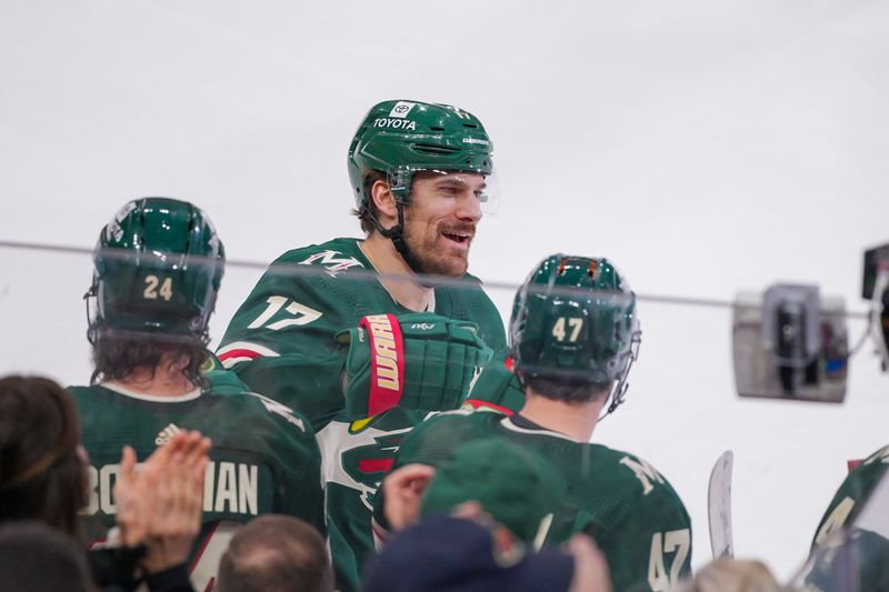 Mar 12, 2024; Saint Paul, Minnesota, USA; Minnesota Wild left wing Marcus Foligno (17) celebrates his goal against the Arizona Coyotes in the third period at Xcel Energy Center. Mandatory Credit: Brad Rempel-USA TODAY Sports