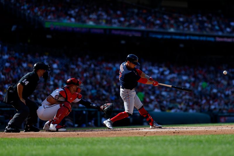 Aug 17, 2023; Washington, District of Columbia, USA;Boston Red Sox third baseman Luis Urias (17) singles against the Washington Nationals during the third inning  at Nationals Park. Mandatory Credit: Geoff Burke-USA TODAY Sports