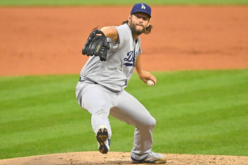 Aug 23, 2023; Cleveland, Ohio, USA; Los Angeles Dodgers starting pitcher Clayton Kershaw (22) delivers a pitch in the first inning against the Cleveland Guardians at Progressive Field. Mandatory Credit: David Richard-USA TODAY Sports