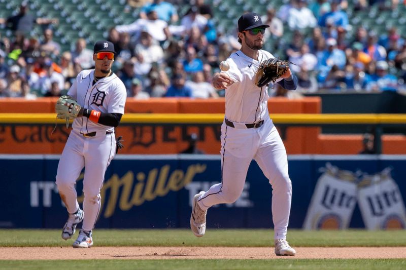 Apr 26, 2024; Detroit, Michigan, USA; Detroit Tigers third baseman Matt Vierling (8) throws the ball to first base for an out in the fifth inning against the Kansas City Royals at Comerica Park. Mandatory Credit: David Reginek-USA TODAY Sports