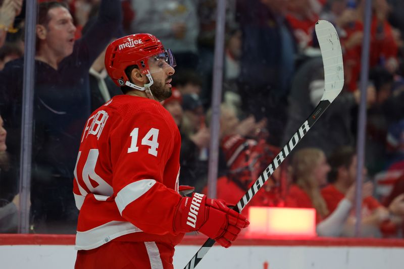 Jan 13, 2024; Detroit, Michigan, USA;  Detroit Red Wings center Robby Fabbri (14) reacts after scoring in the second period against the Los Angeles Kings at Little Caesars Arena. Mandatory Credit: Rick Osentoski-USA TODAY Sports