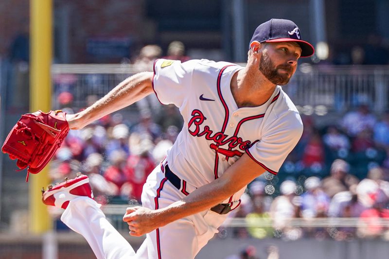 Apr 7, 2024; Cumberland, Georgia, USA; Atlanta Braves starting pitcher Chris Sale (51) pitches against the Arizona Diamondbacks during the first inning at Truist Park. Mandatory Credit: Dale Zanine-USA TODAY Sports