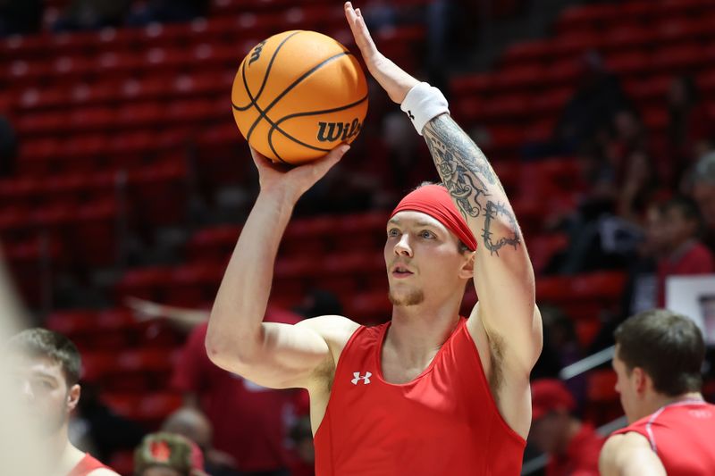 Dec 9, 2023; Salt Lake City, Utah, USA; Utah Utes guard Gabe Madsen (55) warms up before a game against the Brigham Young Cougars at Jon M. Huntsman Center. Mandatory Credit: Rob Gray-USA TODAY Sports