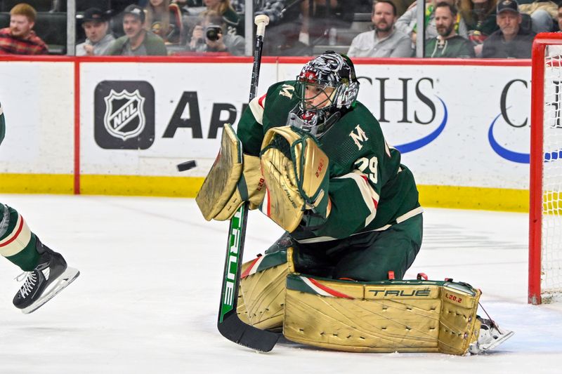 Apr 11, 2023; Saint Paul, Minnesota, USA;  Minnesota Wild goalie Marc-Andre Fleury (29) makes a glove save against the Winnipeg Jets during the third period at at Xcel Energy Center. Mandatory Credit: Nick Wosika-USA TODAY Sports