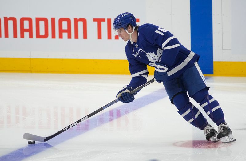 May 5, 2025; Toronto, Ontario, CAN; Toronto Maple Leafs forward Mitch Marner (16) skates with the puck before game one of the second round of the 2025 Stanley Cup Playoffs against the Florida Panthers at Scotiabank Arena. Mandatory Credit: John E. Sokolowski-Imagn Images