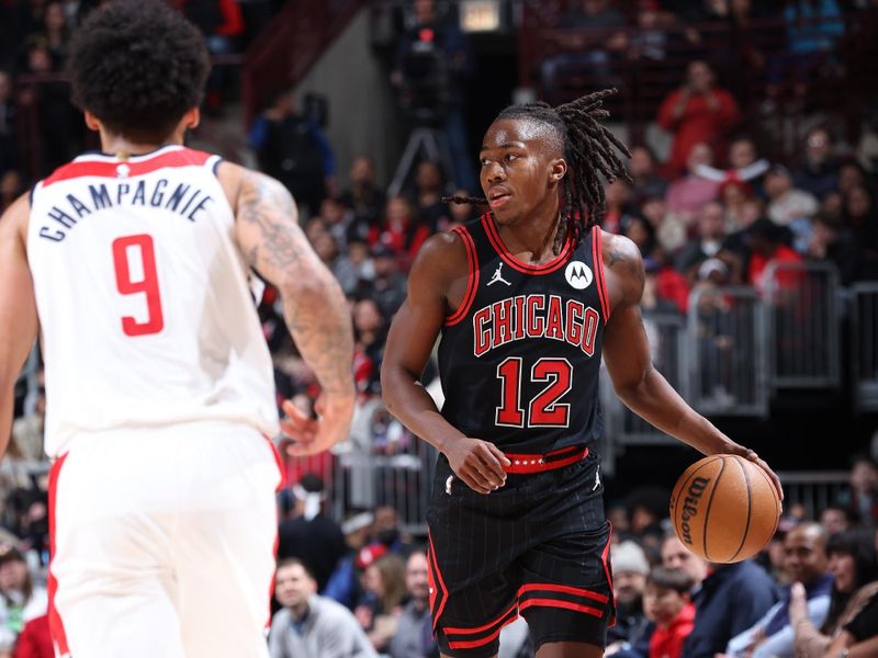 CHICAGO, IL - MARCH 25:  Ayo Dosunmu #12 of the Chicago Bulls dribbles the ball during the game against the Washington Wizards on March 25, 2024 at United Center in Chicago, Illinois. NOTE TO USER: User expressly acknowledges and agrees that, by downloading and or using this photograph, User is consenting to the terms and conditions of the Getty Images License Agreement. Mandatory Copyright Notice: Copyright 2024 NBAE (Photo by Jeff Haynes/NBAE via Getty Images)