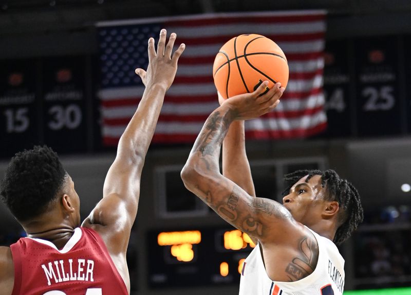 Feb 11, 2023; Auburn, Alabama, USA;  Auburn Tigers guard Allen Flanigan (22) shoots over Alabama Crimson Tide forward Brandon Miller (24) at Neville Arena. Mandatory Credit: Julie Bennett-USA TODAY Sports

