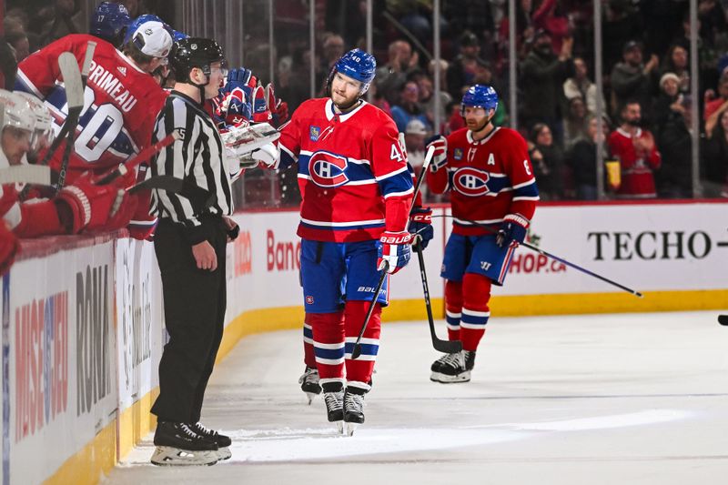 Dec 2, 2023; Montreal, Quebec, CAN; Montreal Canadiens right wing Joel Armia (40) celebrates his goal against the Detroit Red Wings with his teammates at the bench during the second period at Bell Centre. Mandatory Credit: David Kirouac-USA TODAY Sports